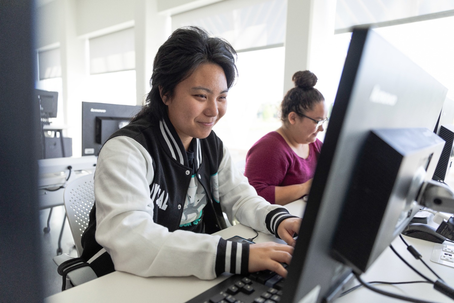 Student working at a computer.